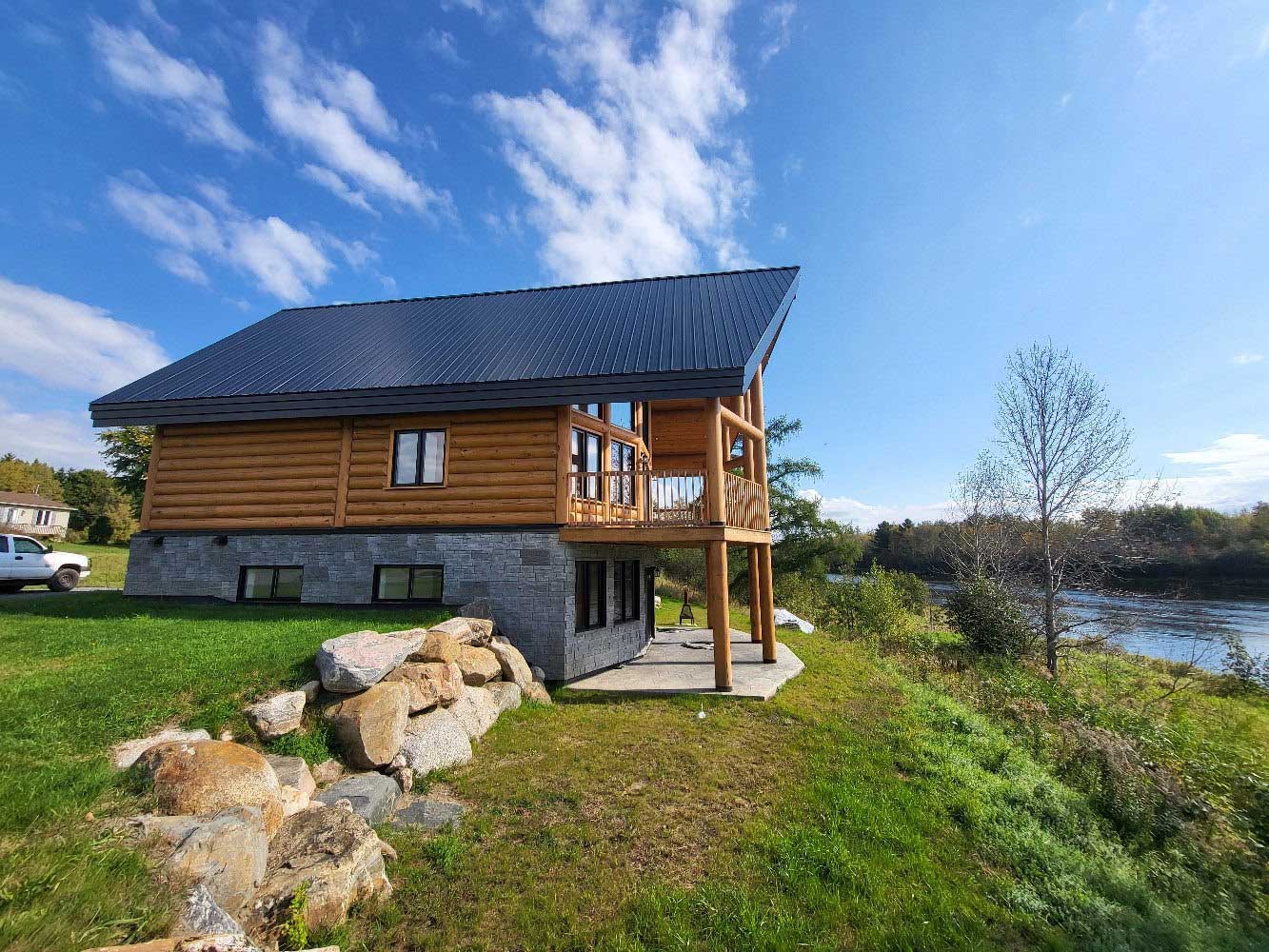 chalet en bois rond au quebec